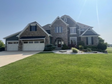 Distinctive Residence in the West Michigan Community of Macatawa on The Macatwa Legends Golf Course in Michigan - for sale on GolfHomes.com, golf home, golf lot
