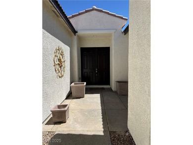 Bring your clubs and your clothes!  This former William Lyon on Mountain Falls Golf Course in Nevada - for sale on GolfHomes.com, golf home, golf lot