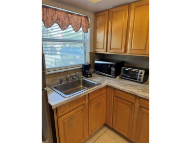 Spacious and cozy 1 bedroom, 1 bathroom condo with lots of on Sunrise Lakes Phase III in Florida - for sale on GolfHomes.com, golf home, golf lot
