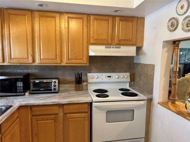 Spacious and cozy 1 bedroom, 1 bathroom condo with lots of on Sunrise Lakes Phase III in Florida - for sale on GolfHomes.com, golf home, golf lot