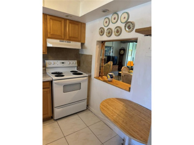 Spacious and cozy 1 bedroom, 1 bathroom condo with lots of on Sunrise Lakes Phase III in Florida - for sale on GolfHomes.com, golf home, golf lot