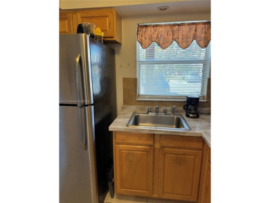 Spacious and cozy 1 bedroom, 1 bathroom condo with lots of on Sunrise Lakes Phase III in Florida - for sale on GolfHomes.com, golf home, golf lot