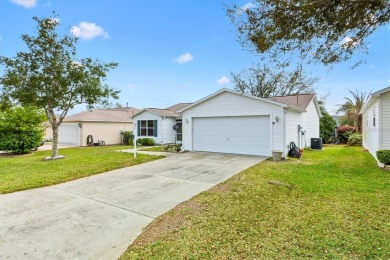 Lovely 3/2 Amarillo home in the Village of Piedmont features an on The Links of Spruce Creek in Florida - for sale on GolfHomes.com, golf home, golf lot