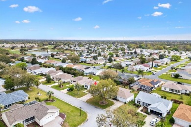 Lovely 3/2 Amarillo home in the Village of Piedmont features an on The Links of Spruce Creek in Florida - for sale on GolfHomes.com, golf home, golf lot