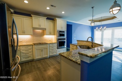 Welcome toyour beautifully maintained 4-bedroom, 3-bath home on Compass Pointe Golf Course in North Carolina - for sale on GolfHomes.com, golf home, golf lot