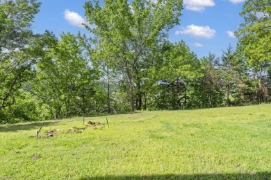 Discover a seamless blend of comfort and convenience in this on Pointe Royale Village Country Club in Missouri - for sale on GolfHomes.com, golf home, golf lot