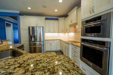 Welcome toyour beautifully maintained 4-bedroom, 3-bath home on Compass Pointe Golf Course in North Carolina - for sale on GolfHomes.com, golf home, golf lot