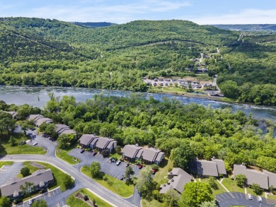 Discover a seamless blend of comfort and convenience in this on Pointe Royale Village Country Club in Missouri - for sale on GolfHomes.com, golf home, golf lot