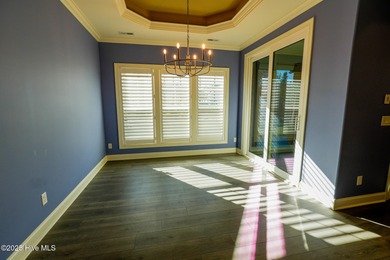 Welcome toyour beautifully maintained 4-bedroom, 3-bath home on Compass Pointe Golf Course in North Carolina - for sale on GolfHomes.com, golf home, golf lot