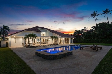 Discover a truly unique and inviting home, meticulously crafted on Bocaire Country Club in Florida - for sale on GolfHomes.com, golf home, golf lot