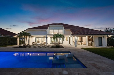 Discover a truly unique and inviting home, meticulously crafted on Bocaire Country Club in Florida - for sale on GolfHomes.com, golf home, golf lot