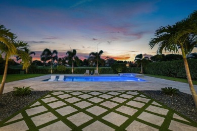 Discover a truly unique and inviting home, meticulously crafted on Bocaire Country Club in Florida - for sale on GolfHomes.com, golf home, golf lot