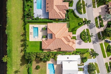 Discover a truly unique and inviting home, meticulously crafted on Bocaire Country Club in Florida - for sale on GolfHomes.com, golf home, golf lot