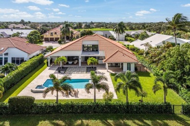 Discover a truly unique and inviting home, meticulously crafted on Bocaire Country Club in Florida - for sale on GolfHomes.com, golf home, golf lot