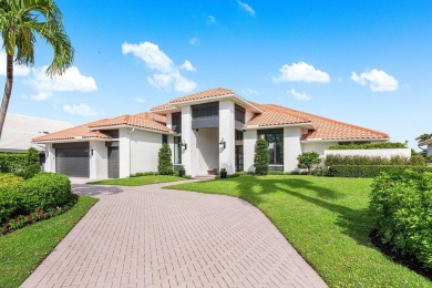 Discover a truly unique and inviting home, meticulously crafted on Bocaire Country Club in Florida - for sale on GolfHomes.com, golf home, golf lot