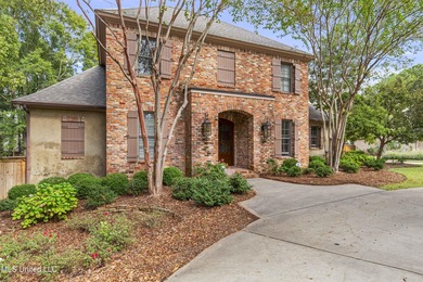 Welcome home to this timeless beauty on Fenwick Circle in on Reunion Golf Club in Mississippi - for sale on GolfHomes.com, golf home, golf lot