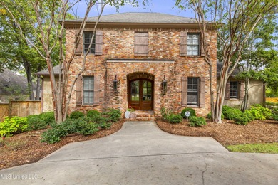 Welcome home to this timeless beauty on Fenwick Circle in on Reunion Golf Club in Mississippi - for sale on GolfHomes.com, golf home, golf lot