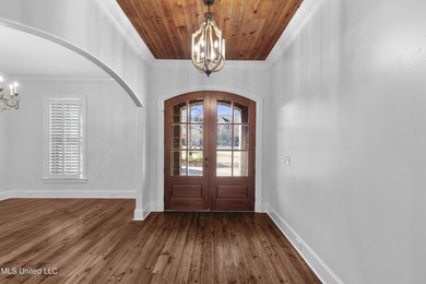 Welcome home to this timeless beauty on Fenwick Circle in on Reunion Golf Club in Mississippi - for sale on GolfHomes.com, golf home, golf lot