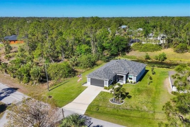 NOT FLOOD ZONE! 
VERY PRIVATE WATERFRONT VIEWS! BUILT in  2022! on Bobcat Trail Golf Club in Florida - for sale on GolfHomes.com, golf home, golf lot