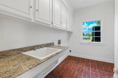 Timeless Colonial-Style Estate on 5 Acres
Step into elegance on  in Louisiana - for sale on GolfHomes.com, golf home, golf lot