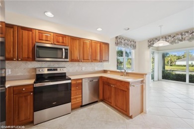 This well appointed first floor condo offers two bedrooms, two on Shadow Wood Country Club in Florida - for sale on GolfHomes.com, golf home, golf lot