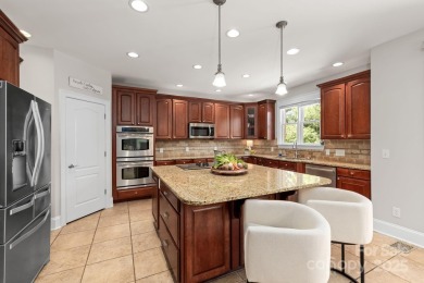 This magnificent home spans three-levels and offers stunning on Verdict Ridge Golf and Country Club in North Carolina - for sale on GolfHomes.com, golf home, golf lot