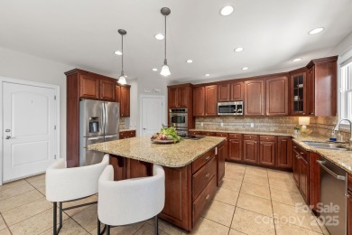 This magnificent home spans three-levels and offers stunning on Verdict Ridge Golf and Country Club in North Carolina - for sale on GolfHomes.com, golf home, golf lot