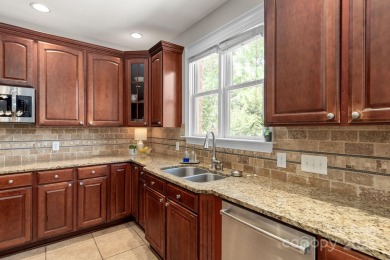 This magnificent home spans three-levels and offers stunning on Verdict Ridge Golf and Country Club in North Carolina - for sale on GolfHomes.com, golf home, golf lot