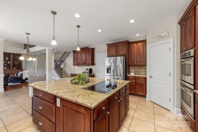 This magnificent home spans three-levels and offers stunning on Verdict Ridge Golf and Country Club in North Carolina - for sale on GolfHomes.com, golf home, golf lot