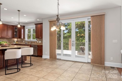 This magnificent home spans three-levels and offers stunning on Verdict Ridge Golf and Country Club in North Carolina - for sale on GolfHomes.com, golf home, golf lot