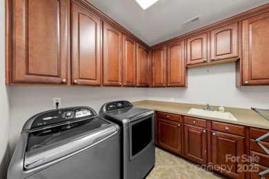 This magnificent home spans three-levels and offers stunning on Verdict Ridge Golf and Country Club in North Carolina - for sale on GolfHomes.com, golf home, golf lot