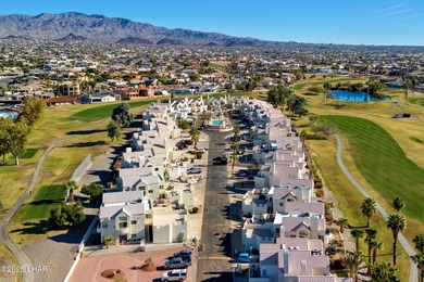Directly on the Golf Course with a protected back and side patio on London Bridge Golf Course in Arizona - for sale on GolfHomes.com, golf home, golf lot