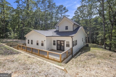 Welcome to this beautiful designed 4-bedroom, 3-bath home on Fairfield Plantation Golf and Country Club in Georgia - for sale on GolfHomes.com, golf home, golf lot