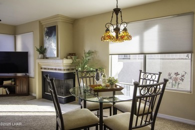 Directly on the Golf Course with a protected back and side patio on London Bridge Golf Course in Arizona - for sale on GolfHomes.com, golf home, golf lot