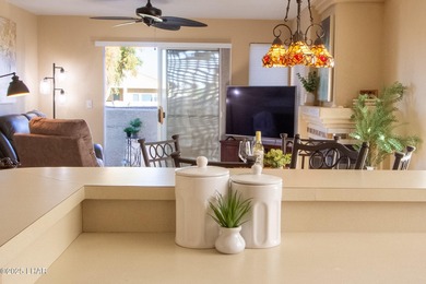 Directly on the Golf Course with a protected back and side patio on London Bridge Golf Course in Arizona - for sale on GolfHomes.com, golf home, golf lot