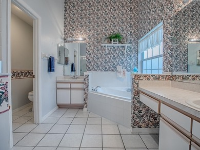 Welcome to this well-maintained 2,000 sq. ft. single-family home on Plantation Golf Club in Florida - for sale on GolfHomes.com, golf home, golf lot