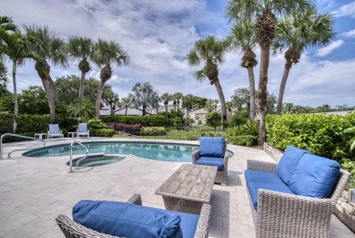 Serene water views frame this totally remodeled and well on Frenchmans Creek Country Club in Florida - for sale on GolfHomes.com, golf home, golf lot