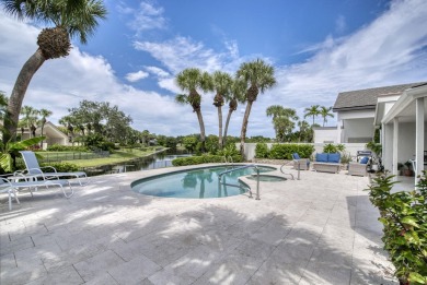 Serene water views frame this totally remodeled and well on Frenchmans Creek Country Club in Florida - for sale on GolfHomes.com, golf home, golf lot