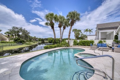 Serene water views frame this totally remodeled and well on Frenchmans Creek Country Club in Florida - for sale on GolfHomes.com, golf home, golf lot