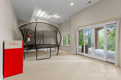 This magnificent home spans three-levels and offers stunning on Verdict Ridge Golf and Country Club in North Carolina - for sale on GolfHomes.com, golf home, golf lot