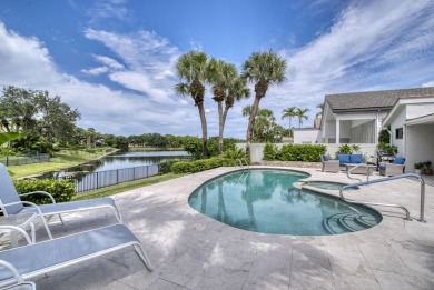 Serene water views frame this totally remodeled and well on Frenchmans Creek Country Club in Florida - for sale on GolfHomes.com, golf home, golf lot