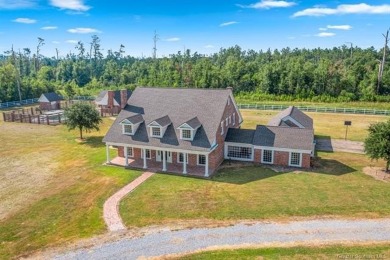 Timeless Colonial-Style Estate on 5 Acres
Step into elegance on  in Louisiana - for sale on GolfHomes.com, golf home, golf lot