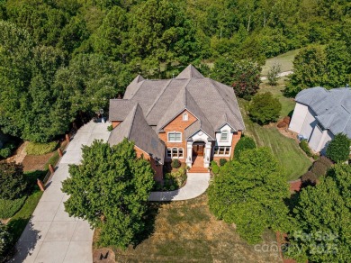 This magnificent home spans three-levels and offers stunning on Verdict Ridge Golf and Country Club in North Carolina - for sale on GolfHomes.com, golf home, golf lot