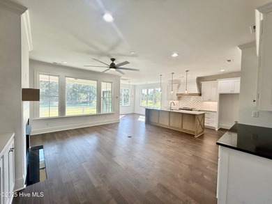 Modern Farmhouse Living Meets Coastal ConvenienceThis modern on River Landing Golf Course in North Carolina - for sale on GolfHomes.com, golf home, golf lot