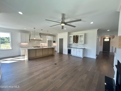 Modern Farmhouse Living Meets Coastal ConvenienceThis modern on River Landing Golf Course in North Carolina - for sale on GolfHomes.com, golf home, golf lot