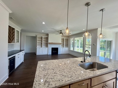Modern Farmhouse Living Meets Coastal ConvenienceThis modern on River Landing Golf Course in North Carolina - for sale on GolfHomes.com, golf home, golf lot