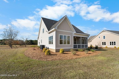 Modern Farmhouse Living Meets Coastal Convenience. A must see on River Landing Golf Course in North Carolina - for sale on GolfHomes.com, golf home, golf lot