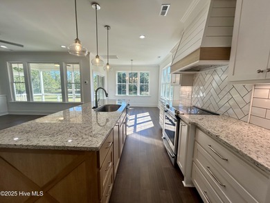 Modern Farmhouse Living Meets Coastal ConvenienceThis modern on River Landing Golf Course in North Carolina - for sale on GolfHomes.com, golf home, golf lot
