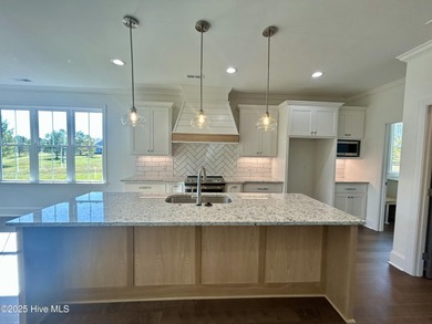 Modern Farmhouse Living Meets Coastal ConvenienceThis modern on River Landing Golf Course in North Carolina - for sale on GolfHomes.com, golf home, golf lot