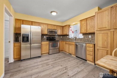 Completely remodeled within the last year featuring brand new on Greeley Country Club in Colorado - for sale on GolfHomes.com, golf home, golf lot